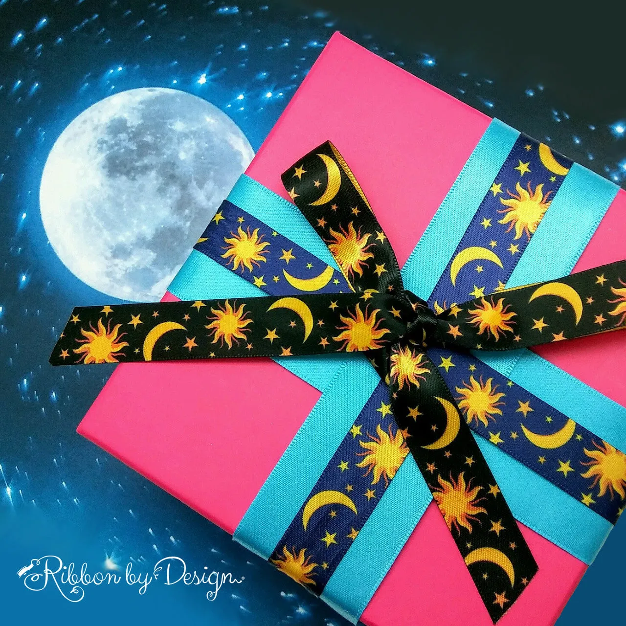 Celestial Ribbon with black  background on 5/8" gold single face satin