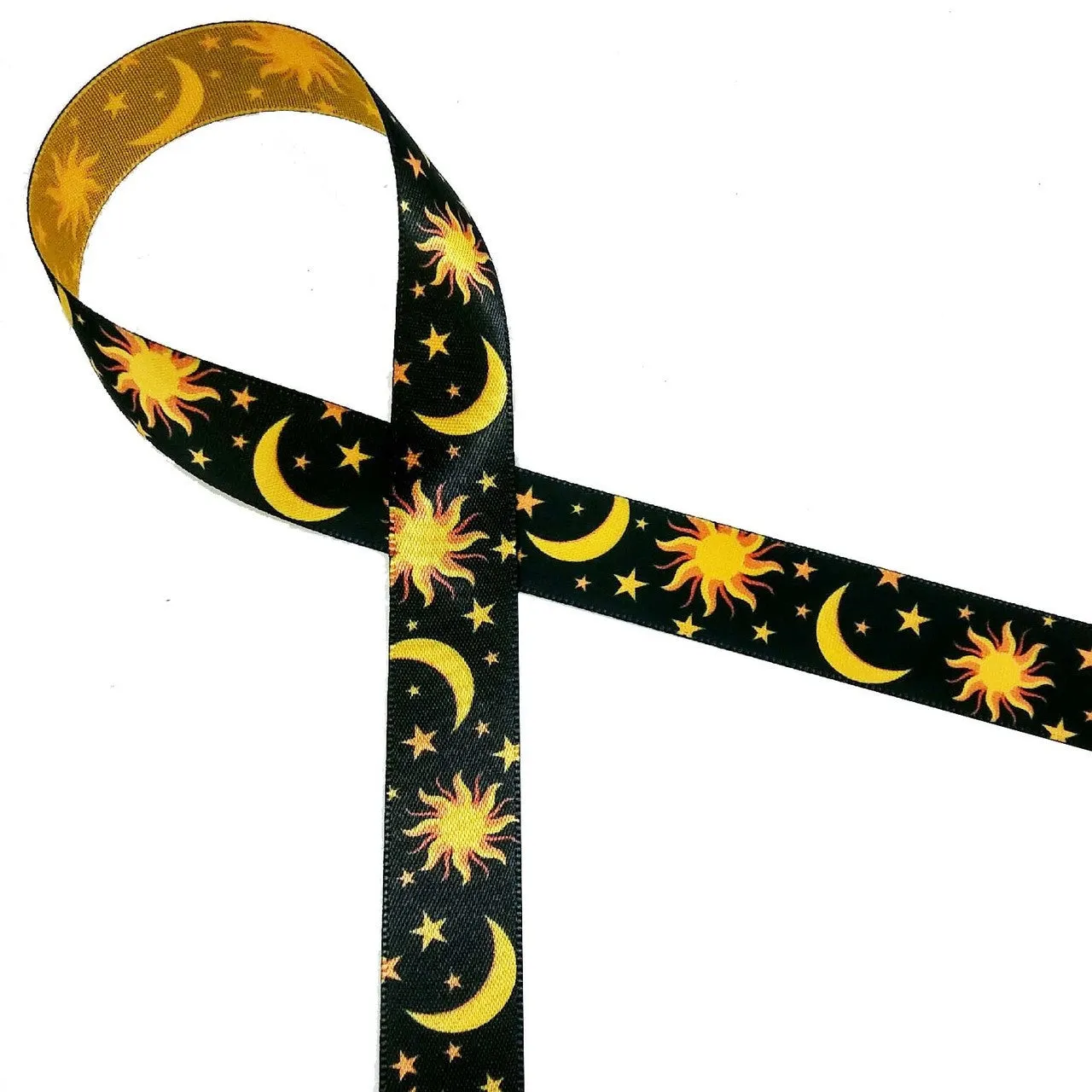 Celestial Ribbon with black  background on 5/8" gold single face satin